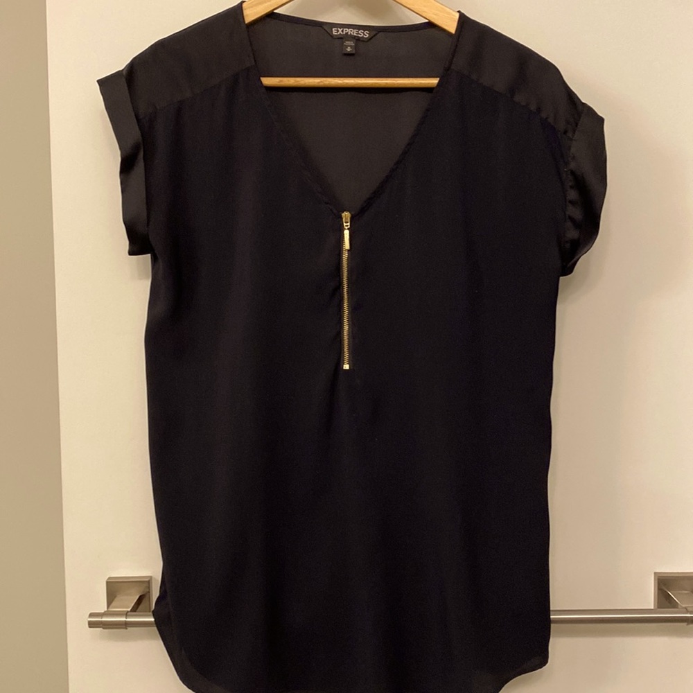 Express blouse that is barely used .
